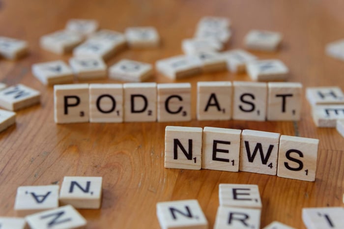local business owner reviewing a digital dashboard showing increased citations from news and government sources